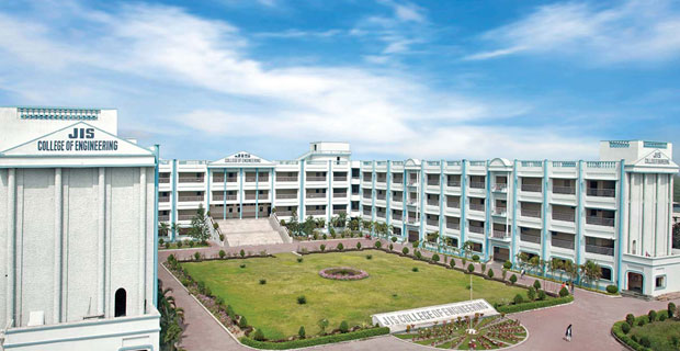 Campus view of JIS College of Engineering featuring a large courtyard surrounded by multi-story academic buildings under a bright blue sky.